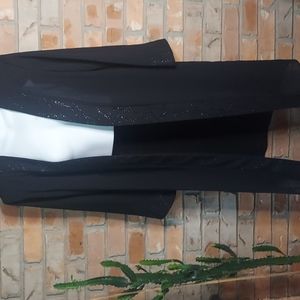 Semi sheer formal jacket with sparkly trim on sleeves/opening g.